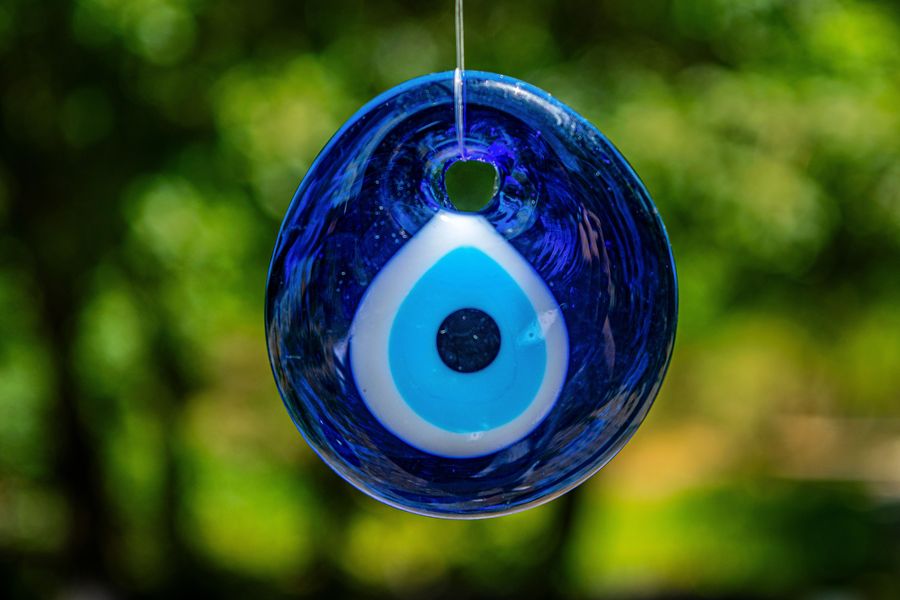 A blue glass nazar bead